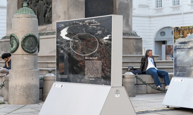 An information board showing plans for the FCC, part of the Code of the Universe exhibit, displayed during FCC Week 2025 in Vienna, Austria. Credit: Joseph Krpelan, Michael Gizicki / CERN